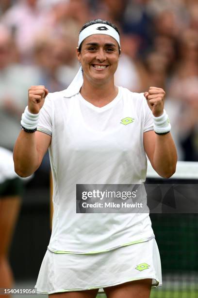 Ons Jabeur of Tunisia celebrates victory against Aryna Sabalenka following the Women's Singles Semi Finals on day eleven of The Championships...