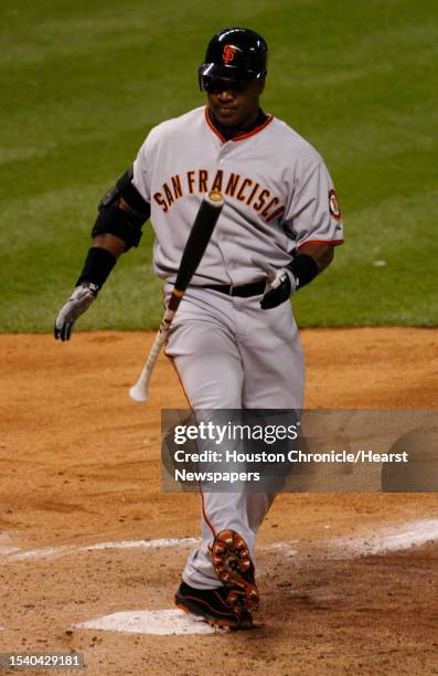 Barry Bonds of the San Francisco Giants reacts to swinging and getting a strike in the fourth inning of his game Monday, May 2006, at Minute Maid...