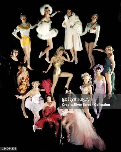 Group of Hollywood actresses in a variety of costumes, circa 1955. They include American actress Ann Blyth .