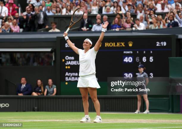 Ons Jabeur of Tunisia celebrates victory against Aryna Sabalenka following the Women's Singles Semi Finals on day eleven of The Championships...