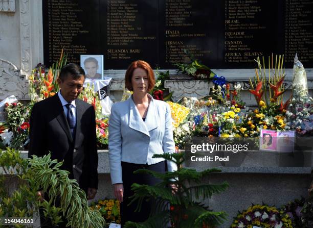 Australian Prime Minister Julia Gillard with Bali governor Made Mangku Pastika visits the 2002 Bali bombings memorial monument on the Indonesian...