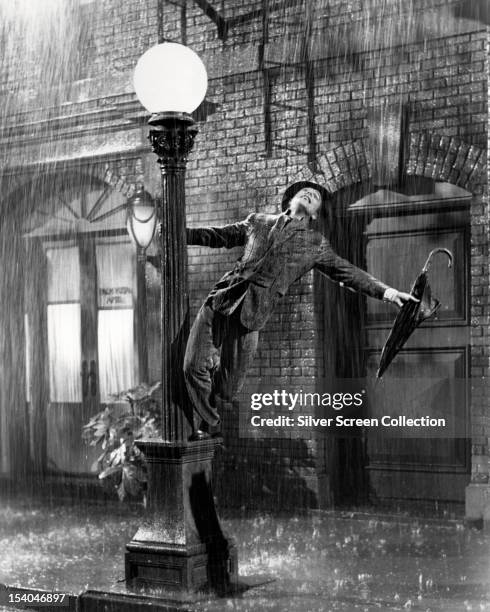 American actor and dancer Gene Kelly as Don Lockwood in 'Singin' In The Rain', directed by Kelly and Stanley Donen, 1952.