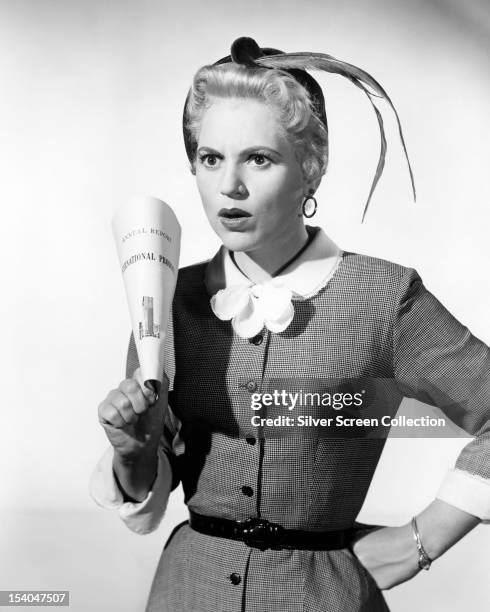 American actress Judy Holliday as Laura Partridge in 'The Solid Gold Cadillac', directed by Richard Quine, 1956.