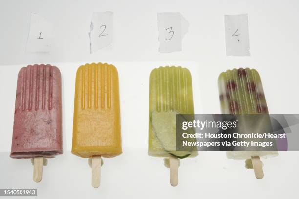 Left to right; Strawberries, kiwis 'n' milk; mango, orange and chile; pineapple cucumber; green grape and red grape frozen popsicles for Mary Vuong...