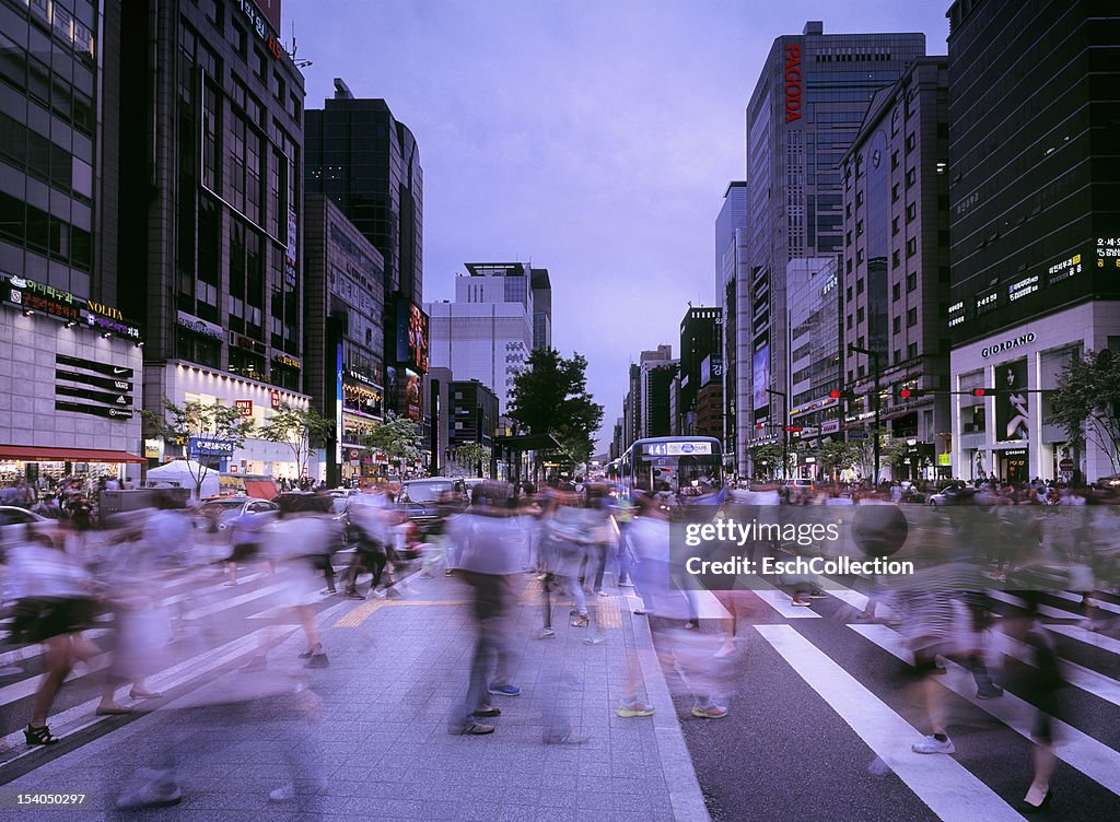 People crossing street at busy Gangnam in Seoul