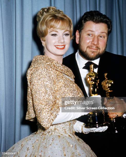 American actress Shirley Jones and English actor Peter Ustinov with their oscars at the 33rd Academy Awards, Santa Monica, California, 17th April...