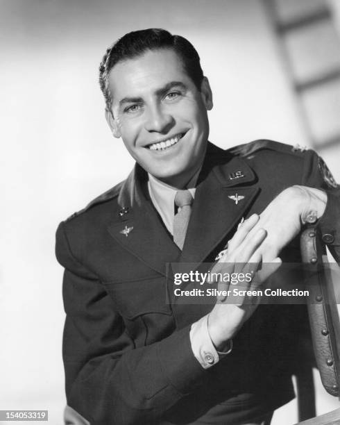 American actor John Hodiak as Spike Romway in 'The Miniver Story', directed by HC Potter, 1950.