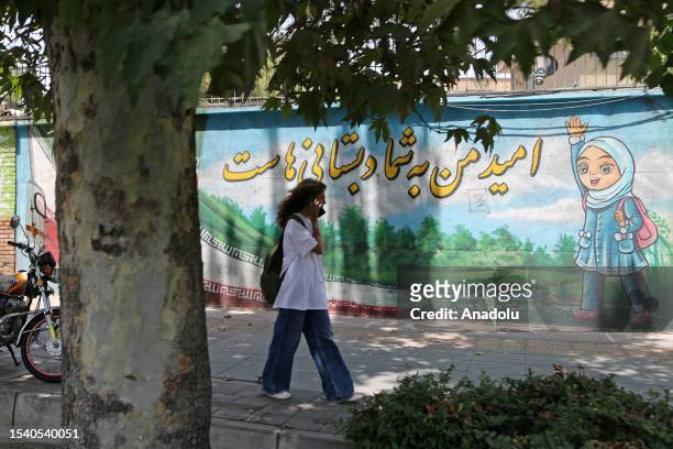 Women walk on the streets during daily life as the country's morality police resume hijab patrols in Tehran, Iran on July 18, 2023. ''Prosecutors in...