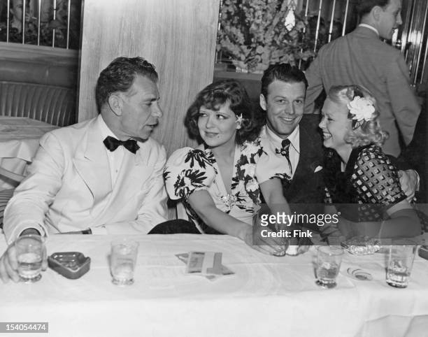 From left to right, actors Charles Ruggles, Clara Bow , her husband Rex Bell and Toby Wing at Bow and Bell's new cafe, the 'It' Cafe, in Hollywood,...