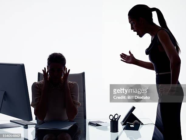 bullying in the workplace - harassment work stockfoto's en -beelden