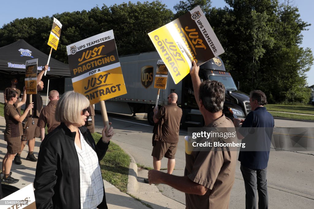 Ups Members UPS workers and Teamsters members practice picket outside a UPS... News ...