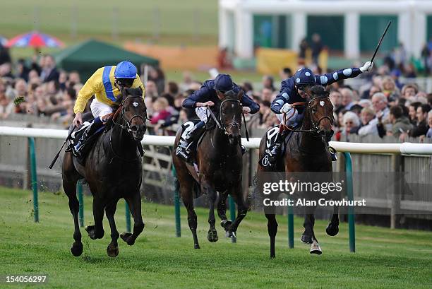 Gerald Mosse riding Reckless Abandon win The vision.ae Middle Park Stakes from Moohaajim at Newmarket racecourse on October 13, 2012 in Newmarket,...
