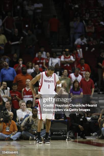 Houston Rockets guard Tracy McGrady drops his head as the Utah Jazz shoot freethrows twords the end of the fourth quarter of Game 2 of the NBA...