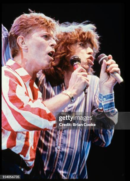 David Bowie and Mick Jagger performing on stage at The Prince's Trust 10th Birthday Party at Wembley Arena, London, United Kingdom on 20th June 1986.