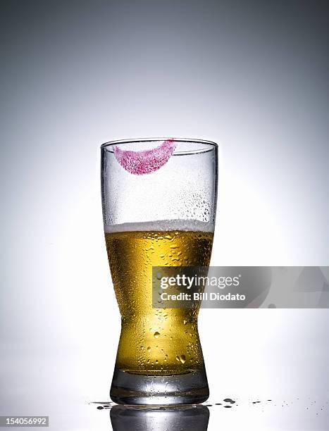 partially dranken beer with lipstick - dranken stock pictures, royalty-free photos & images