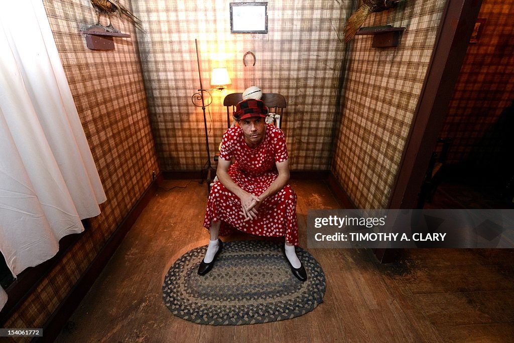 An actor portrays serial killer Edward Theodore "Ed" Gein at Killers ...