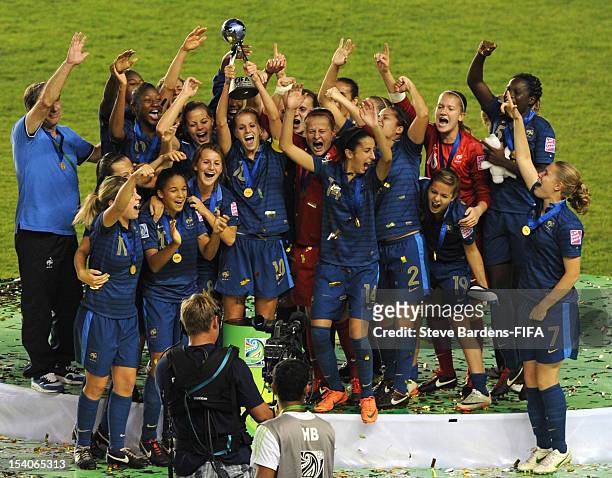 The players of France celebrate with the trophy after victory in the FIFA U-17 Women's World Cup 2012 Final between France and Korea DPR at the Tofig...