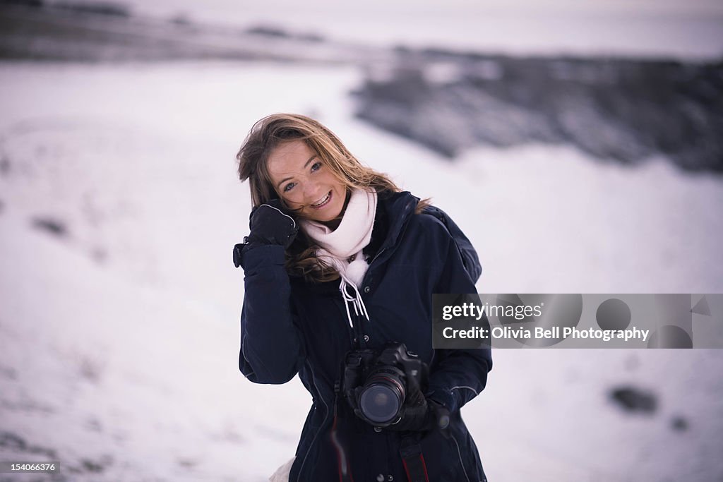 Girl Smiling at Camera in Snow