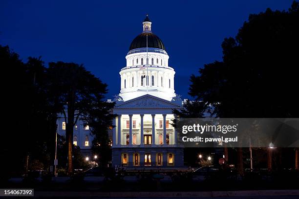 state capitol building in scaramento by night - california capitol stock pictures, royalty-free photos & images