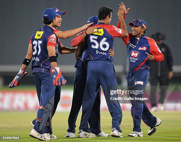 Irfan Pathan of the Daredevils celebrates with his team mates after capturing the wicket of Manvinder Bisla of the Knight Riders during the Karbonn...