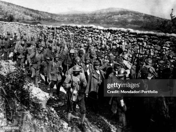 Group of Austrian soldiers has been captured by the Troops of the Entente in the area of Monte Ermada during the Tenth Battle of the Isonzo. Friuli...