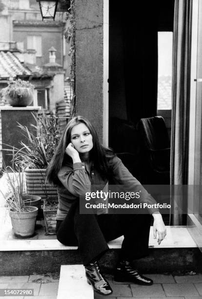 Portrait of the Italian actress Lucia Bose on the terrace of her house. Rome, January 1970