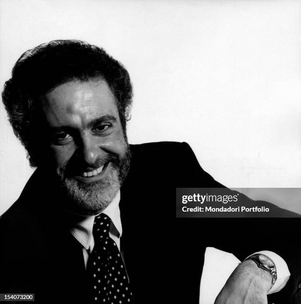 Portrait of Italian journalist Claudio Rinaldi smiling. He was the director of Italian-language weekly magazines L'Espresso, L'Europeo and Panorama....