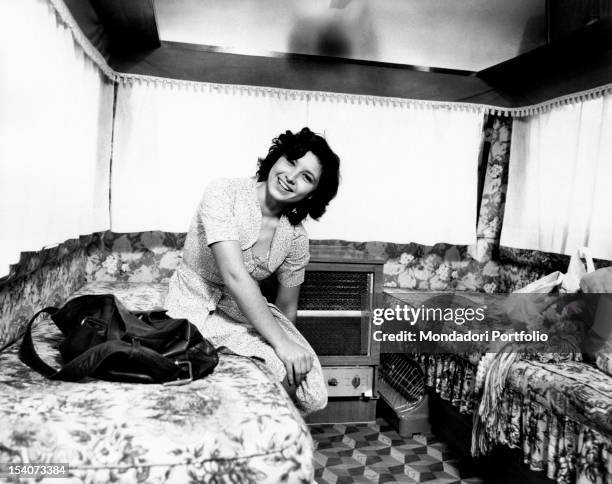 The Italian actress Lina Polito having a rest in the dressing room waiting to act in Salvo D'Acquisto. Rome, 1975