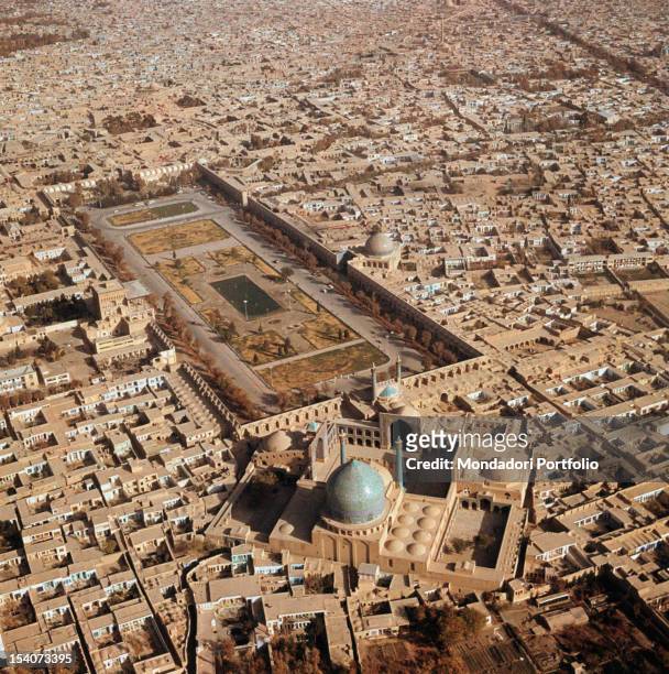 Aerial view of the city, Naqsh-e Jahan Square and the Mosque of the Shah. Esfahan, sixties