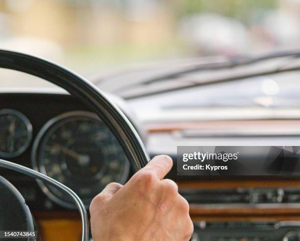 person driving car -  drivers point of view through windshield - classic car point of view stock-fotos und bilder