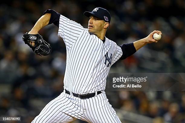 Andy Pettitte of the New York Yankees throws a pitch against the Detroit Tigers during Game One of the American League Championship Series at Yankee...