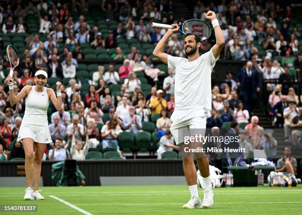 Mate Pavic of Croatia and Lyudmyla Kichenok of Ukraine celebrate winning the Championship Point during the Mixed Doubles Final against Joran Vilegen...