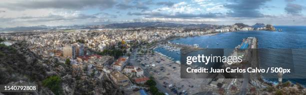high angle view of buildings by sea against sky,murcia,spain - murcia stock pictures, royalty-free photos & images