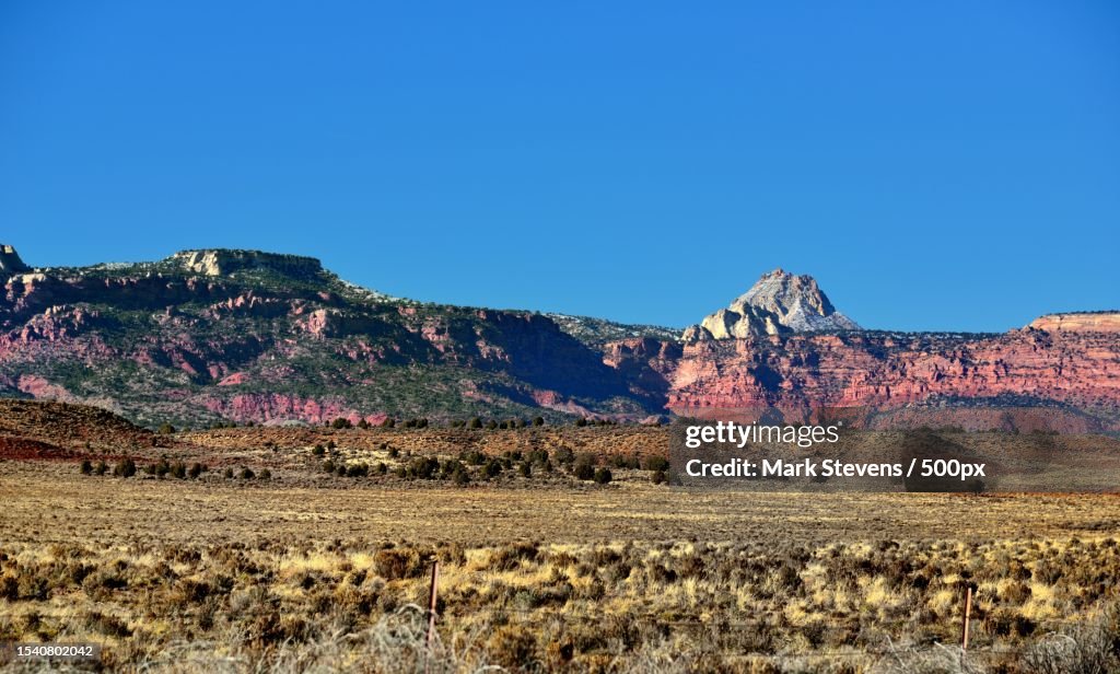 Scenic view of rocky mountains against clear blue sky,Utah,United States,USA