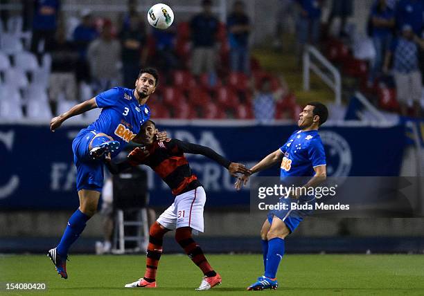Liedson of Flamengo fights for the ball with Leo and Ceara of Cruzeiro during a match between Flamengo and Cruzeiro as part of the Brazilian Serie A...