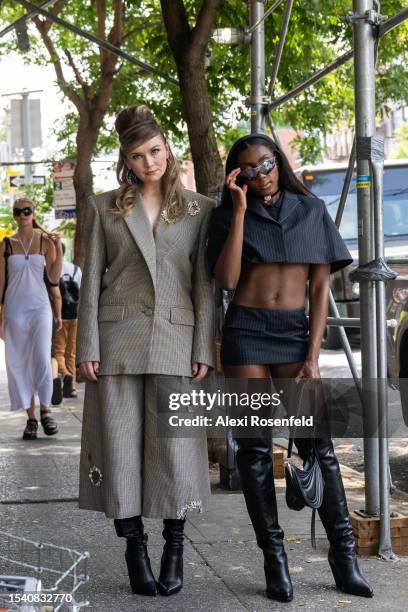 Anna Delvey and Ziwe pose outside Delvey's apartment on July 13, 2023 in New York City. Delvey was released from prison on good behavior in February...