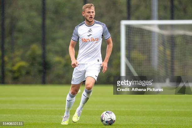 Harry Darling of Swansea City controls the ball during a pre-season friendly match between Swansea City and Newport County at the Fairwood Training...