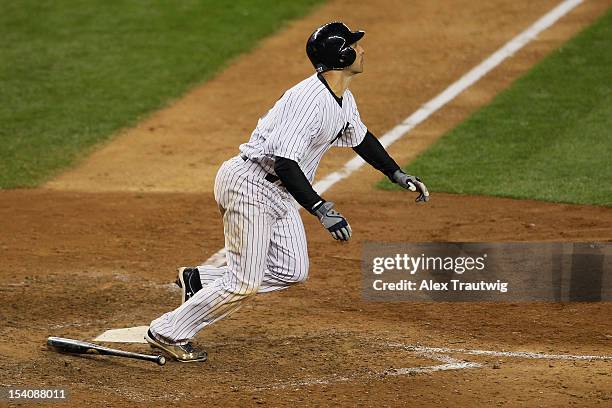 Raul Ibanez of the New York Yankees hits a 2-run home run in the bottom of the ninth inning againt the Detroit Tigers during Game One of the American...