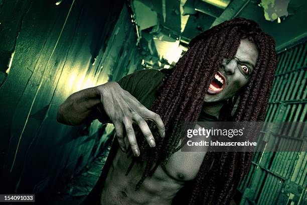 pictures of real zombie attack in jail cell hallway - psychotic stock pictures, royalty-free photos & images