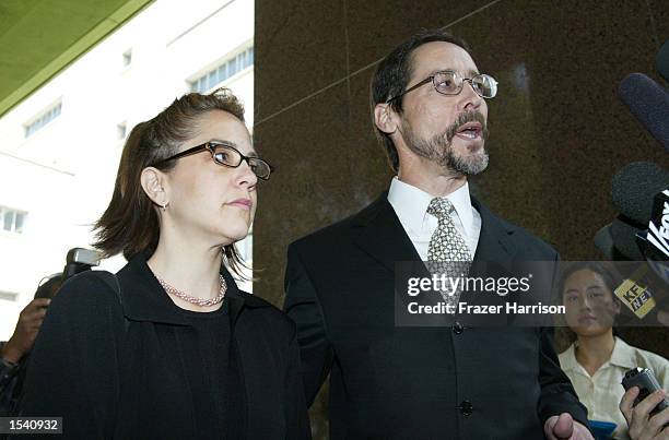 Robert Blake's daughter, Delinah, fields questions with her attorney, Terry McNiff, outside the Van Nuys courthouse after a Superior Court...