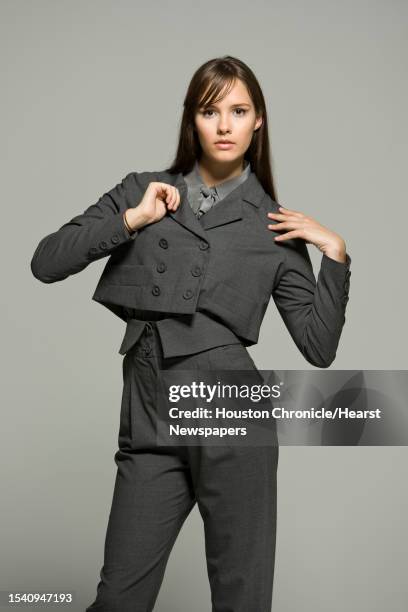 Kate Baxter of the Neal Hamil Agency wears items from the Caycee Black fall-winter 2009 collection, including the wool Gentlemen jacket in charcoal,...