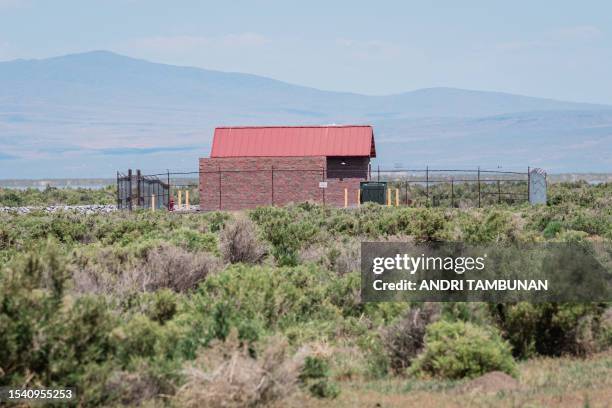 An electrical substation is seen at Fish Springs Ranch, near Reno, Nevada, on June 29, 2023. Beneath a bone-dry Nevada lake bed, close to the dusty...