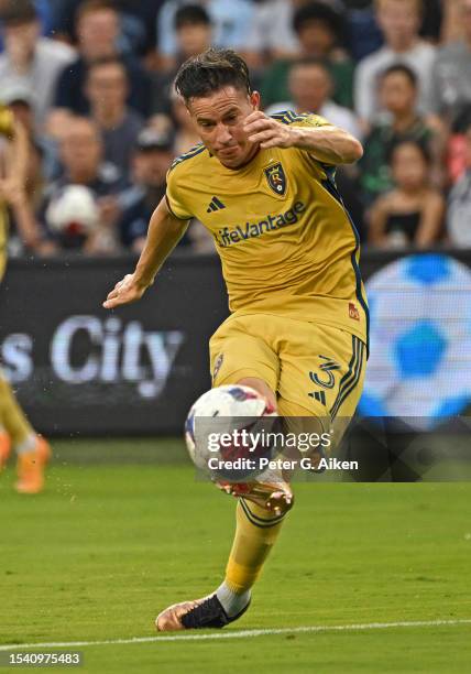 Bryan Oviedo of Real Salt Lake takes a shot on goal in the first half against Sporting Kansas City on July 12, 2023 at Children's Mercy Park in...