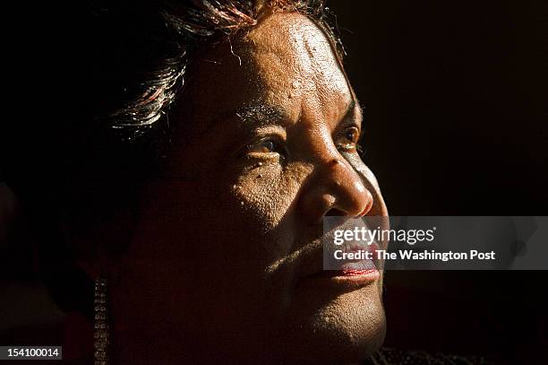 Queen Washington poses for a portrait at her home on June 14, 2012 in Washington, D.C. On August 12 her son, Wilbur "Stephanie" Thomas was shot and...