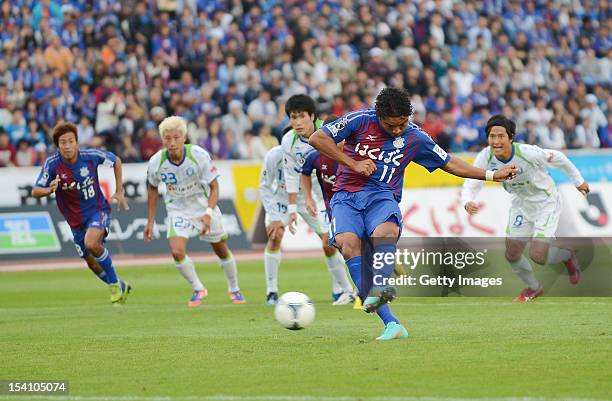 Davi Jose Silva Do Nascimento of Ventforet Kofu scores the equalising goal from the penalty spot during the J.League second division match between...