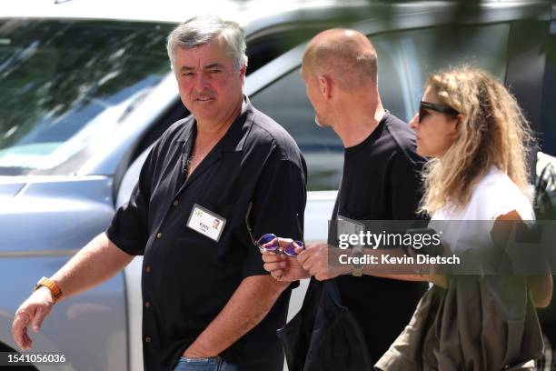 Eddy Cue, Apple's Senior Vice President of Services, and David Allemann , Co-Chairman of Holding AG, leave a morning session at the Allen & Company...