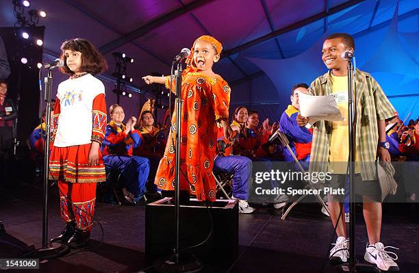 Sarrayah Davis of NY, rehearses lines with Zachary Hendrixlyn of Belize and Fariba Pourooshasb of Iran in preperation for the concert "A Celebration...