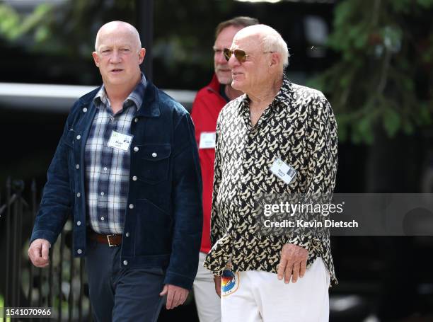 Barry Diller , Chairperson of IAC, and Bryan Lourd, managing director and co-chairman of Creative Artists Agency, walk together at the Allen &...