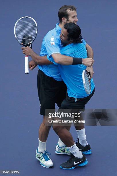Leander Paes of India and Radek Stepanek of Czech Republic celebrate match point against Mahesh Bhupathi and Rohan Bopanna of India during the...