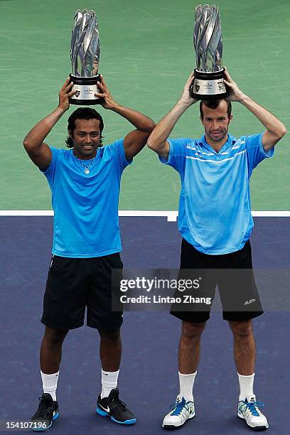 Leander Paes of India and Radek Stepanek of the Czech pose for photographers after defeqating Mahesh Bhupathi and Rohan Bopanna of India during the...